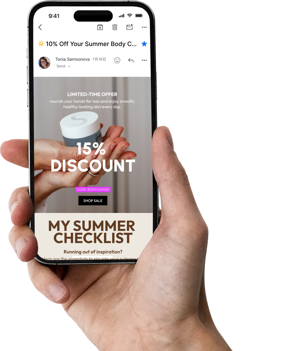 a hand holding an iphone with email marketing interface