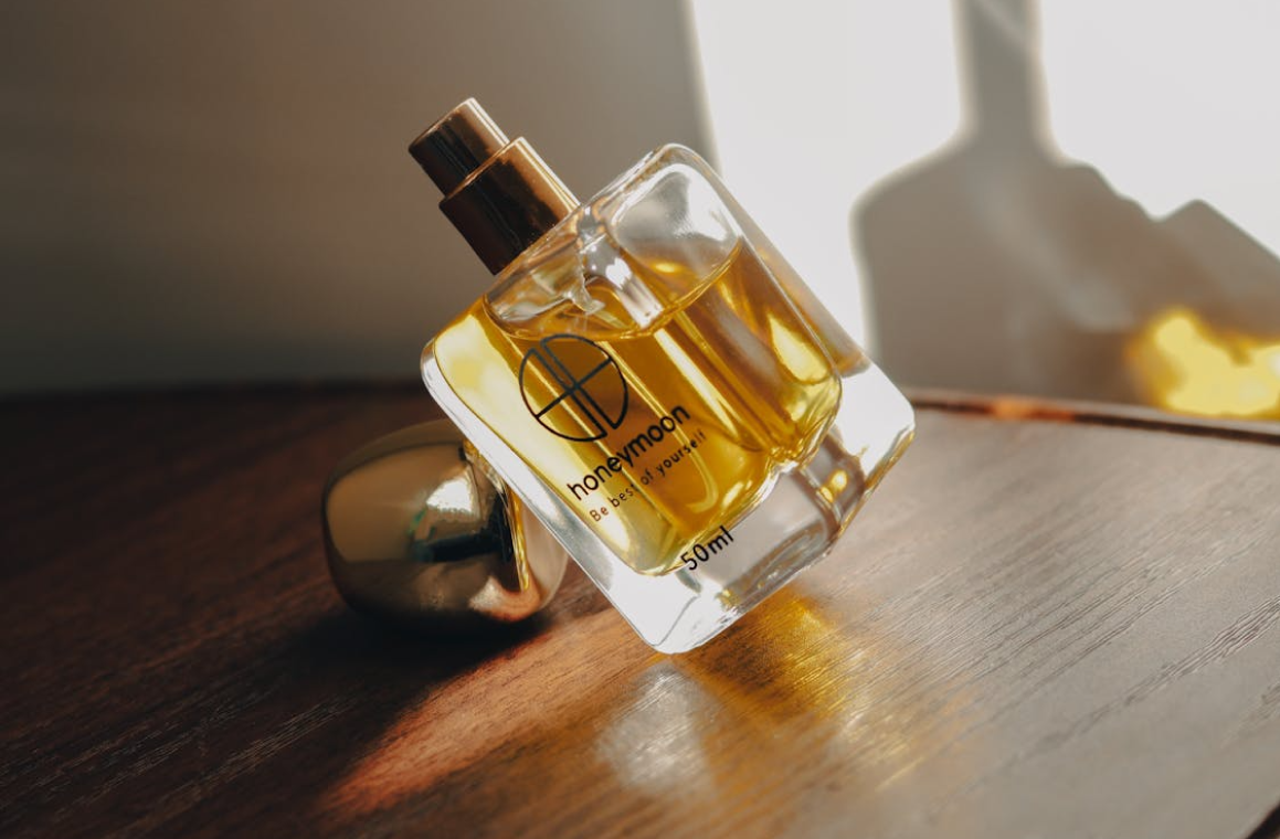 fregrance bottle on the wood table