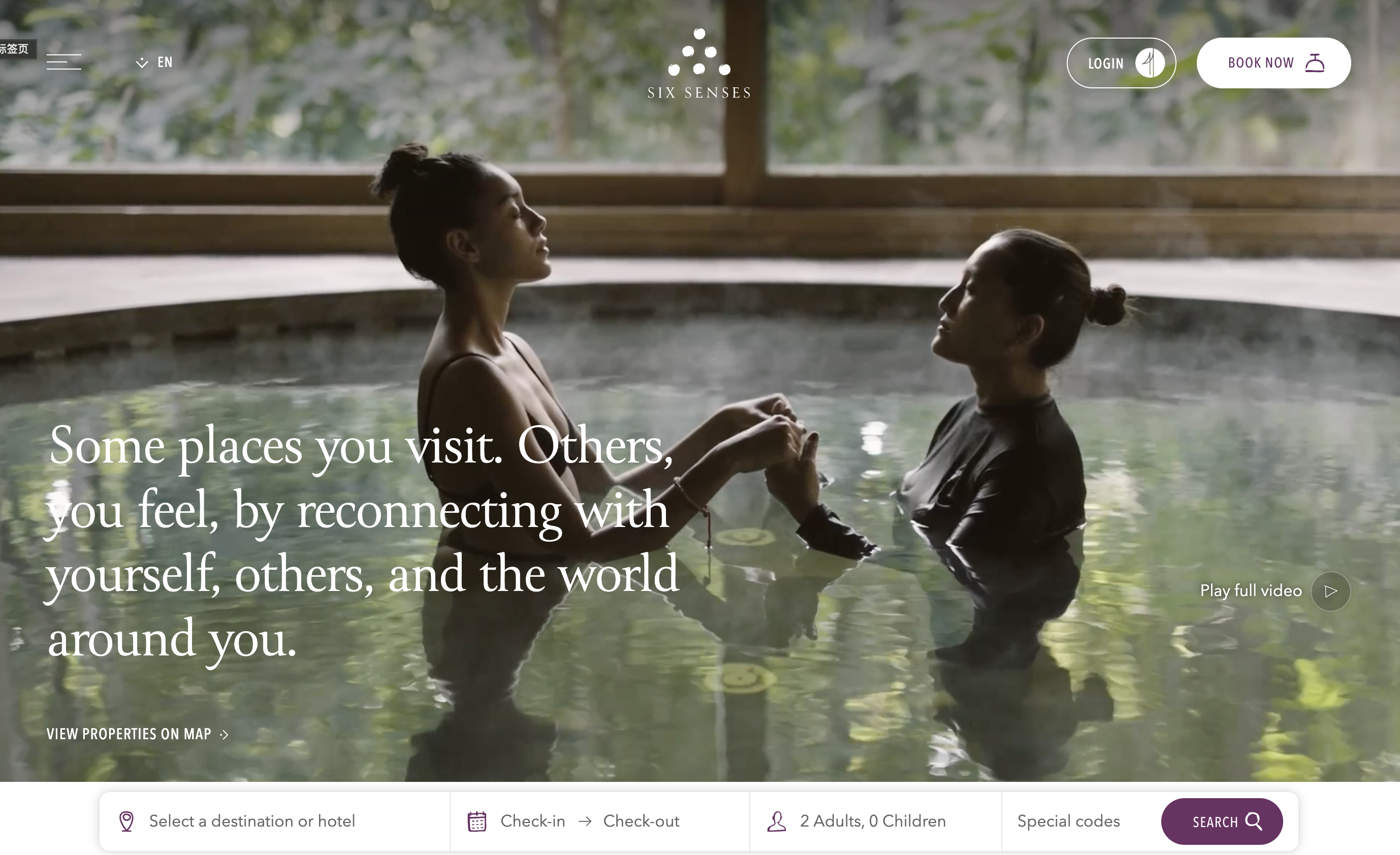 Six Senses wellness resort homepage hero banner, spa hot spring scene with two women, mindfulness travel tagline, top site navigation, hotel booking search form at bottom