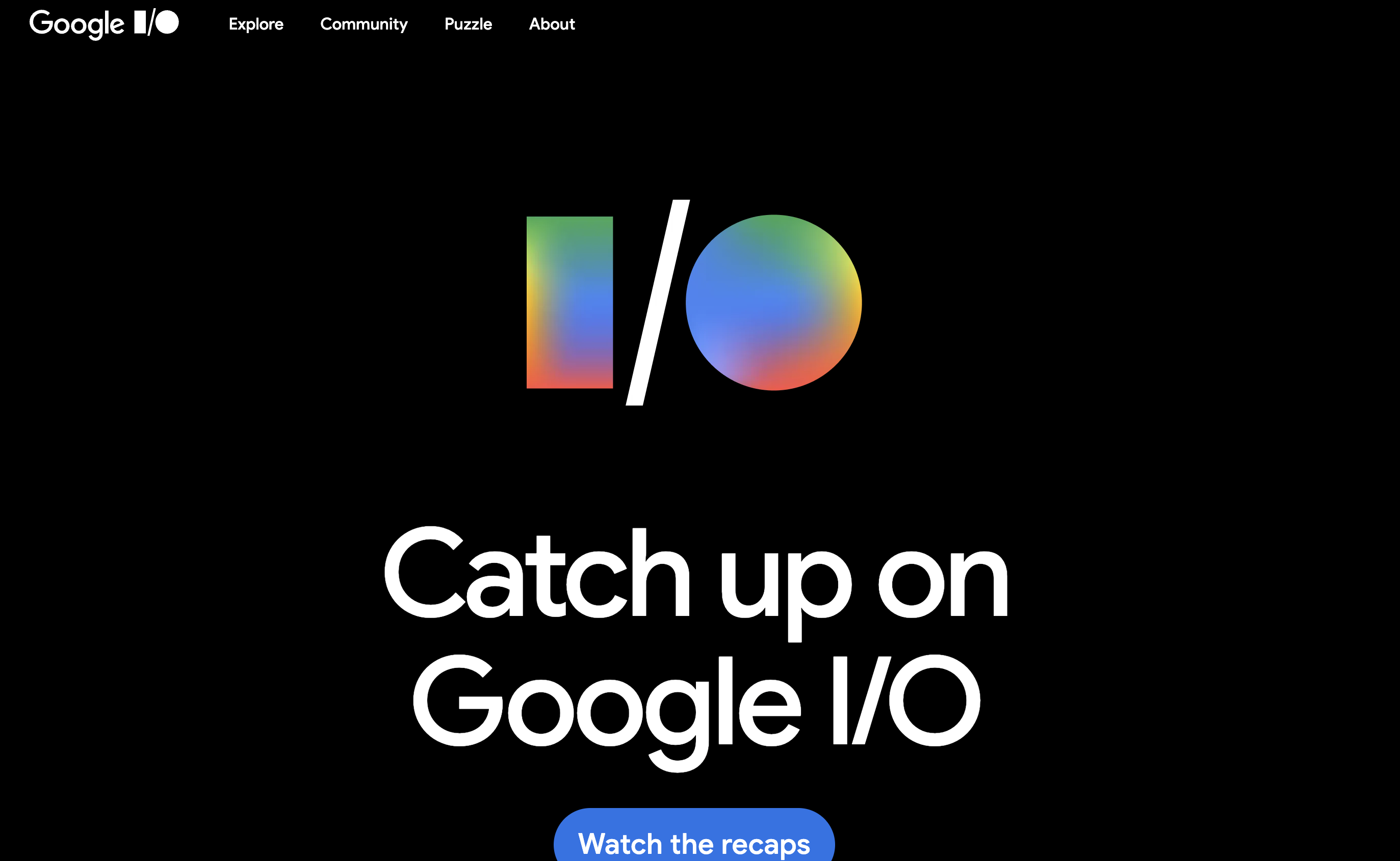 Google I/O conference homepage hero banner, black dark mode minimalist layout, gradient I/O logo, recap watch call-to-action button, top site navigation menu
