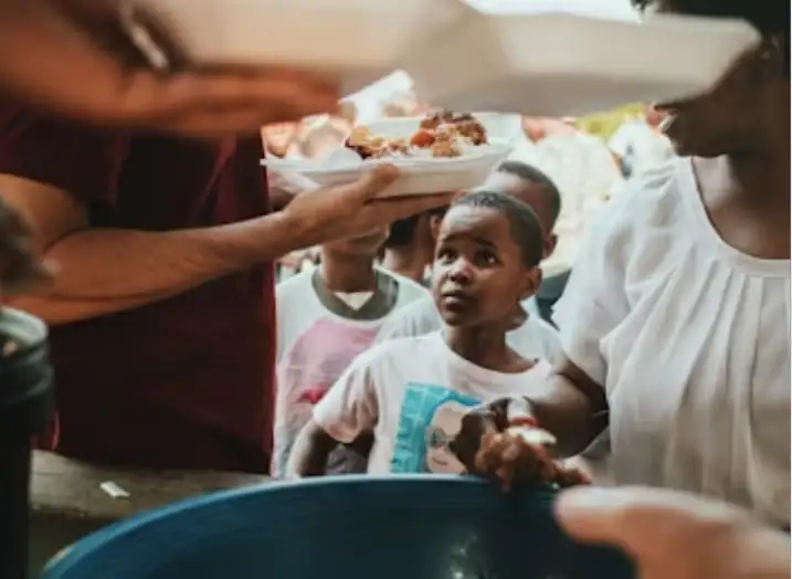 people doing charity in poor regions