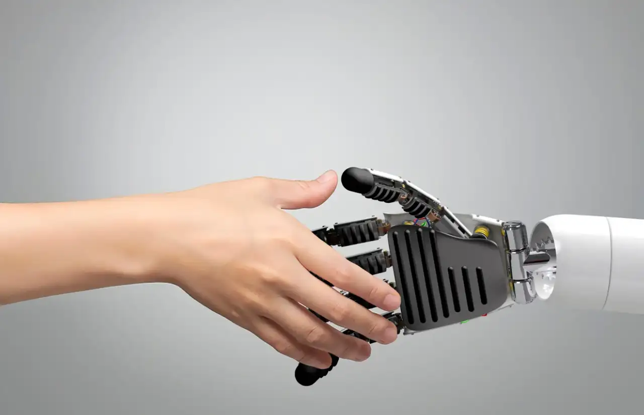 human hands shaking with robot hands