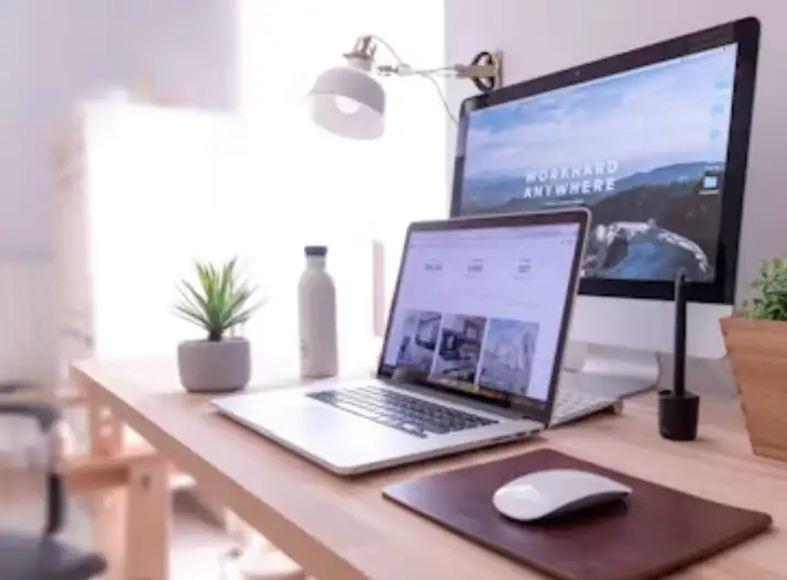 a desktop and a monitor on the desk