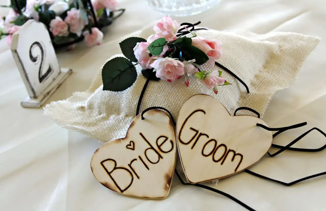 a wedding decoration on the bed