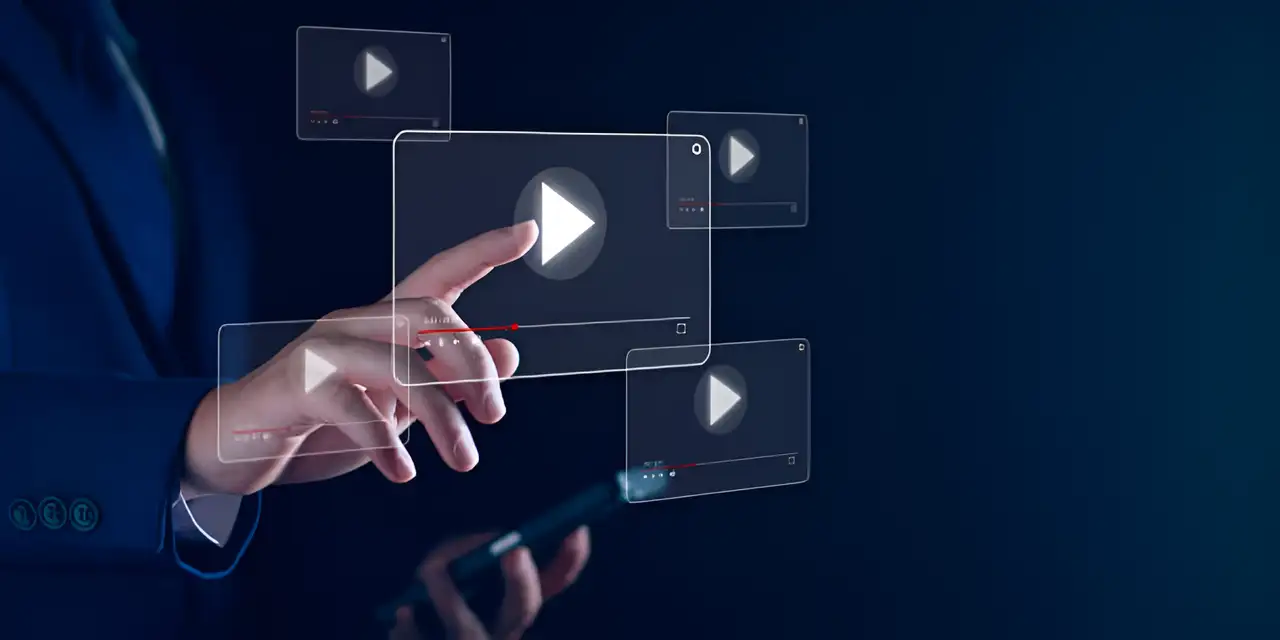 a man clicks on videos on screen