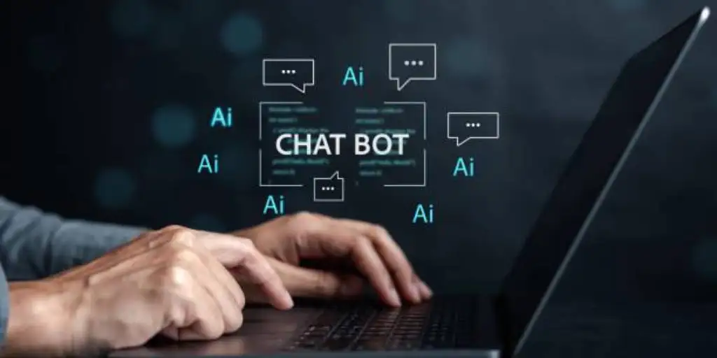 hands typing on a laptop with the text "chatbot" and ai icons surrounding