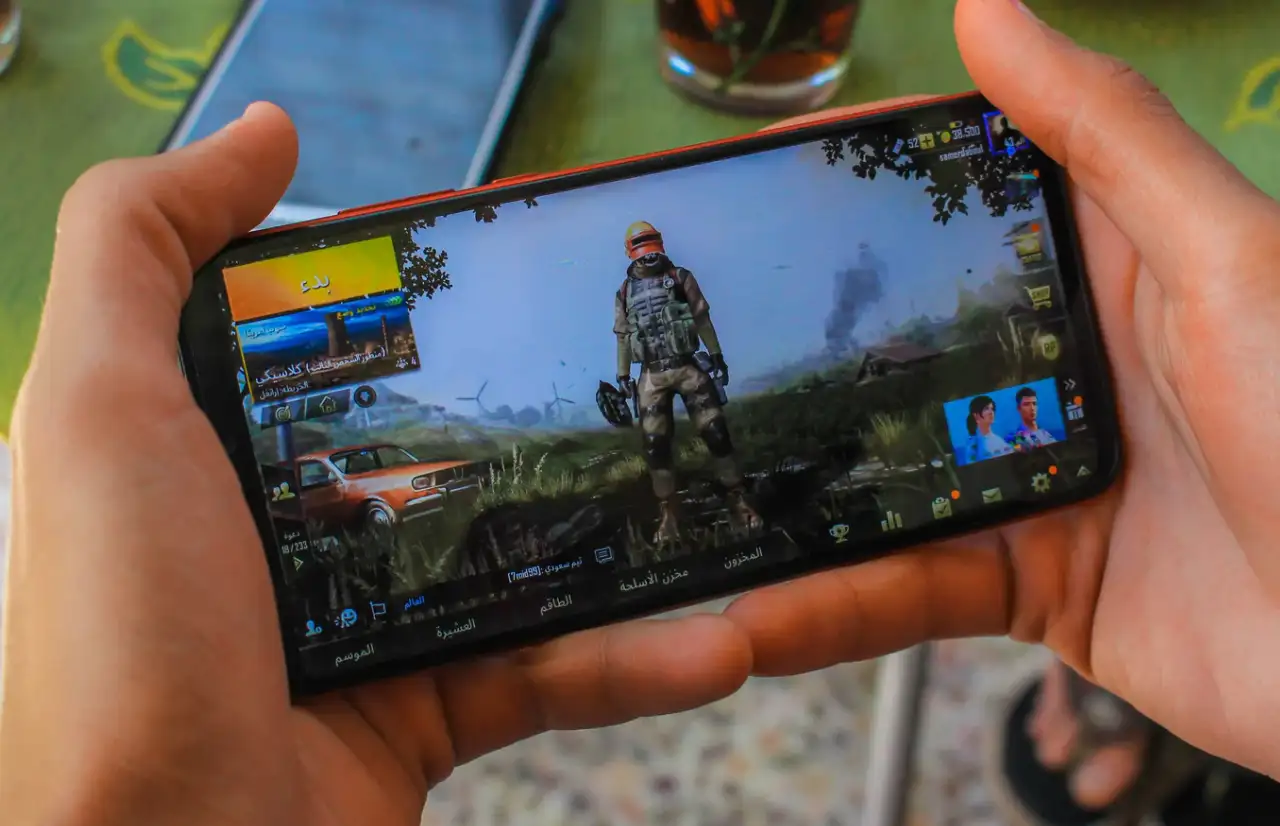 people playing games on a phone