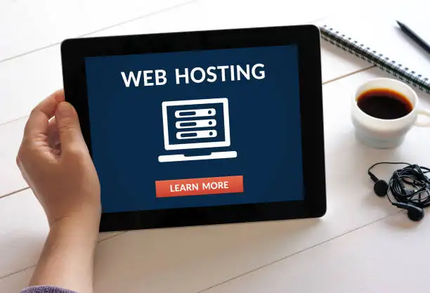 an ipad with web hosting icon on its screen