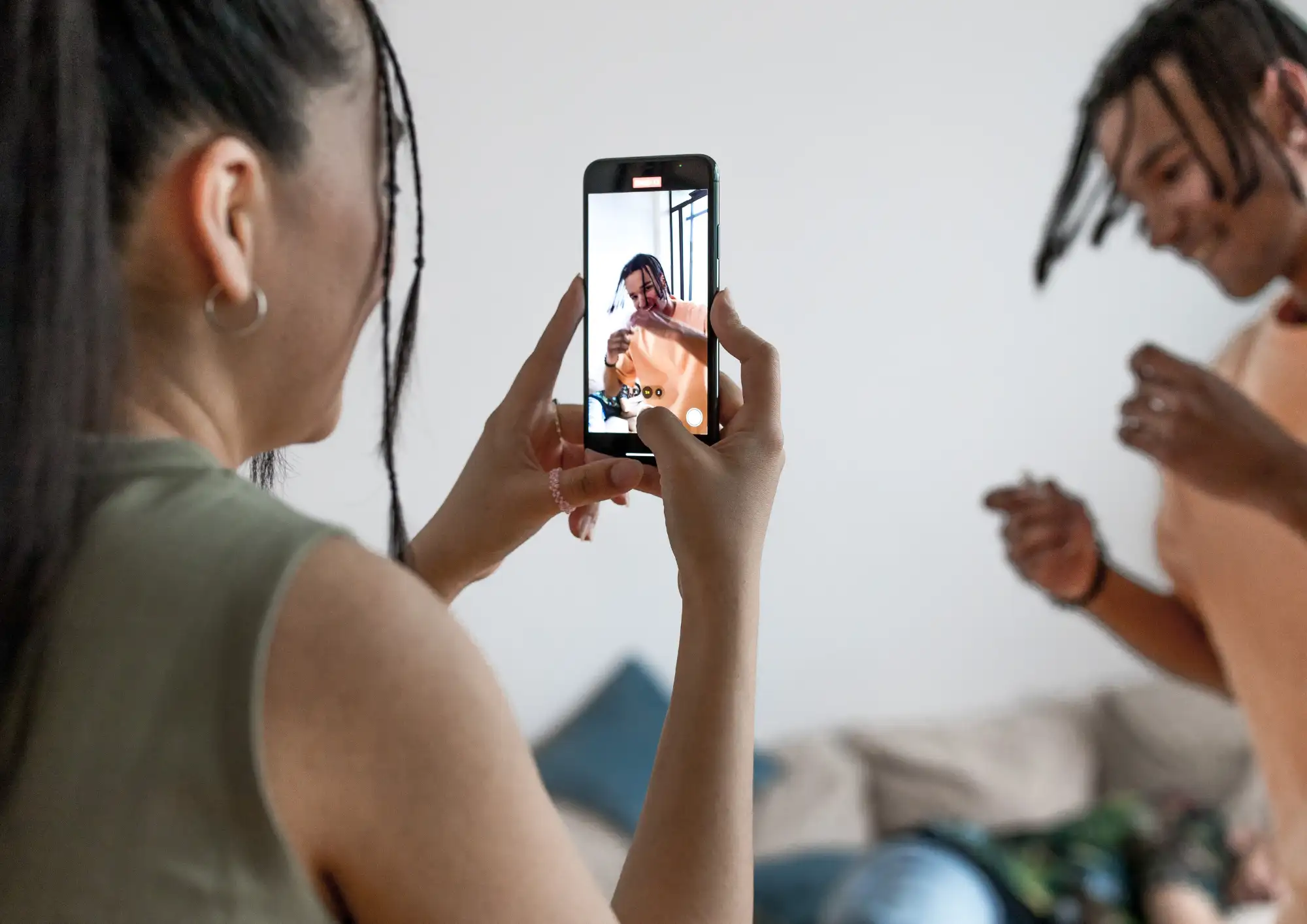 a girl making video for a boy