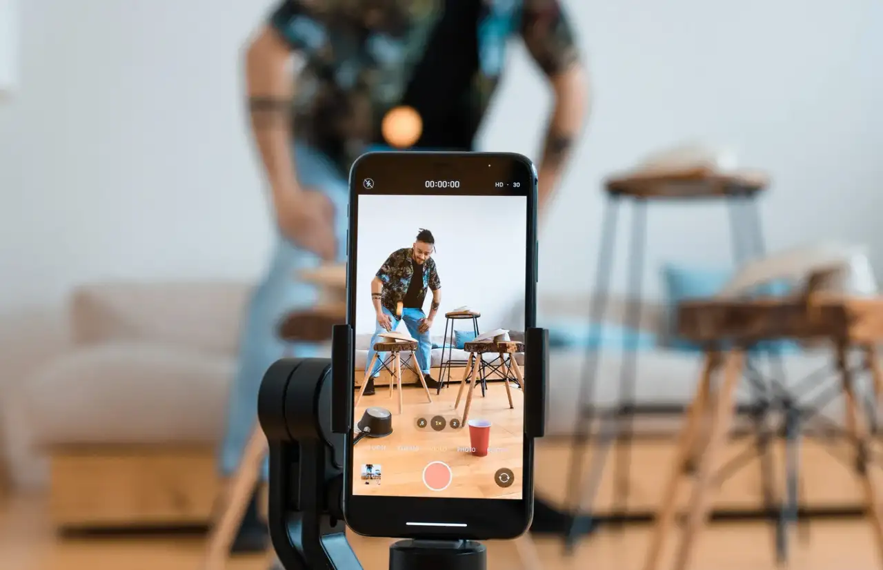 a man shooting for tiktok video