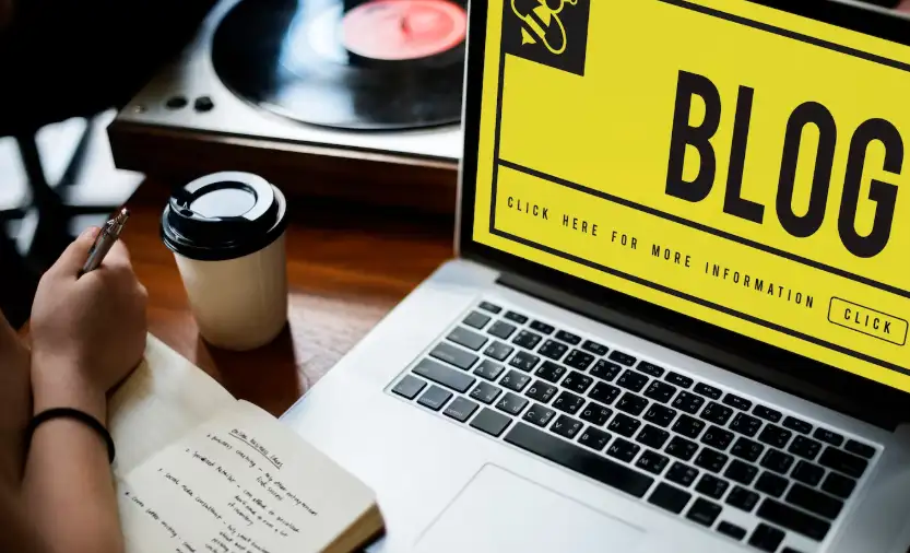 An individual is writing a blog online