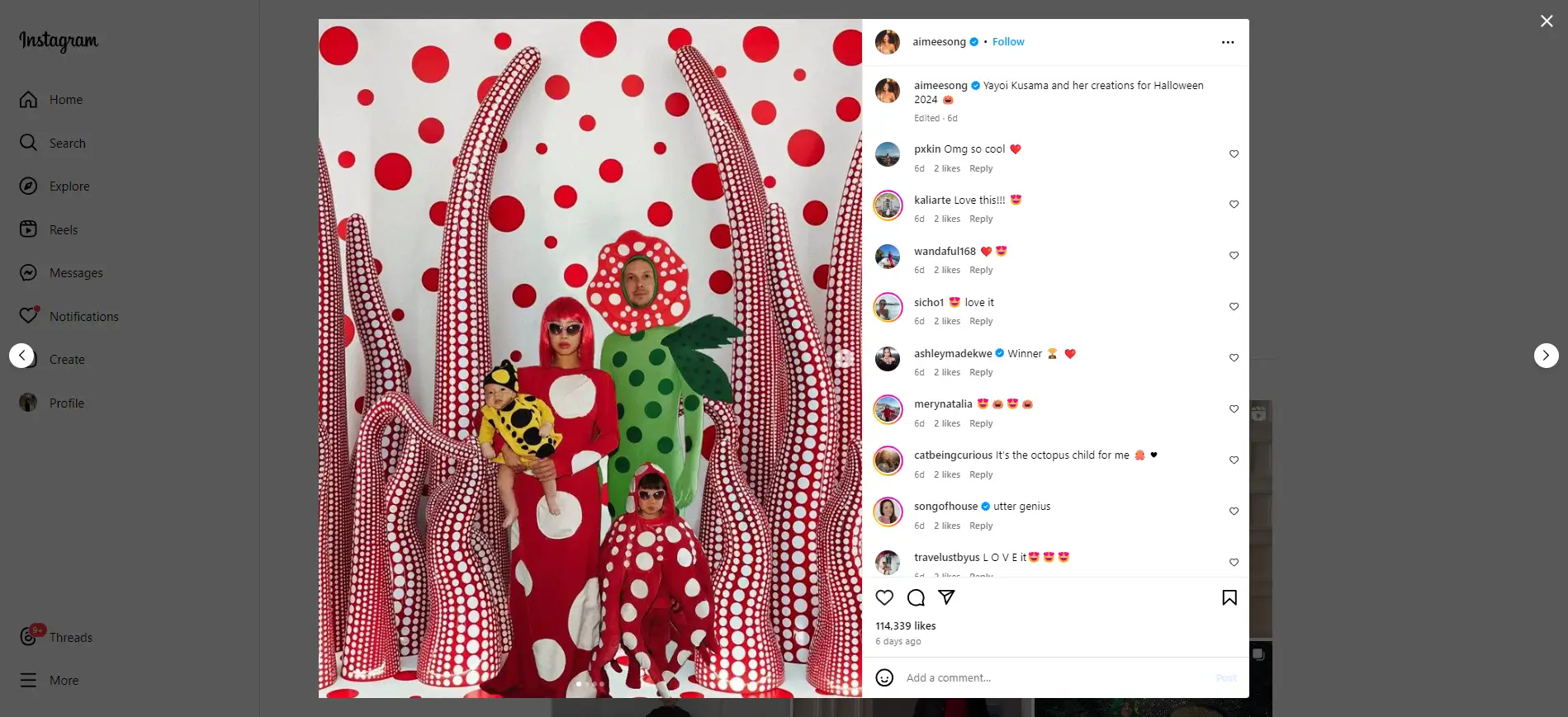 group in polka dot outfits posing amidst yayoi kusama art