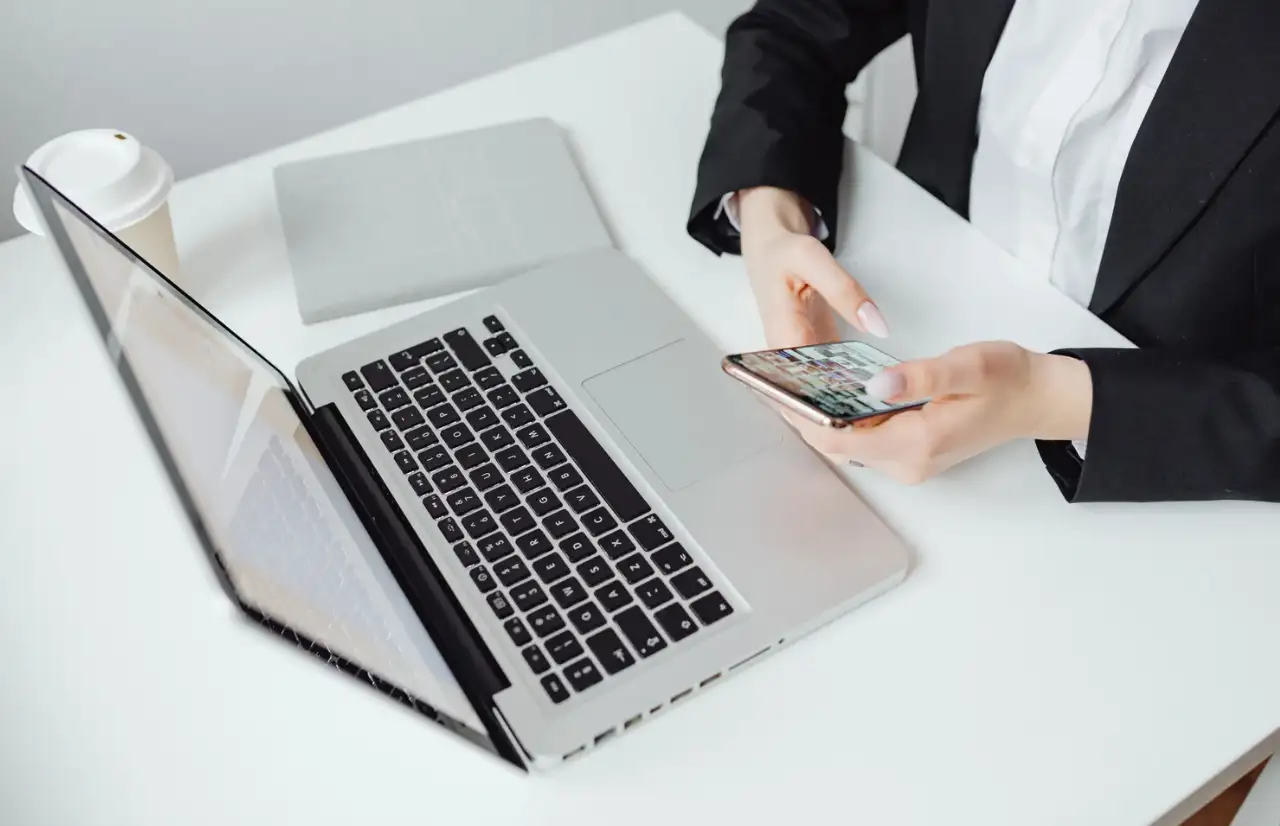 women sitting in front of a computer
