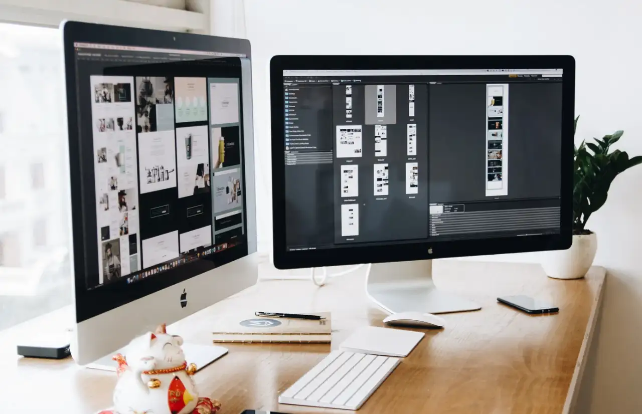 people designing websites on computer