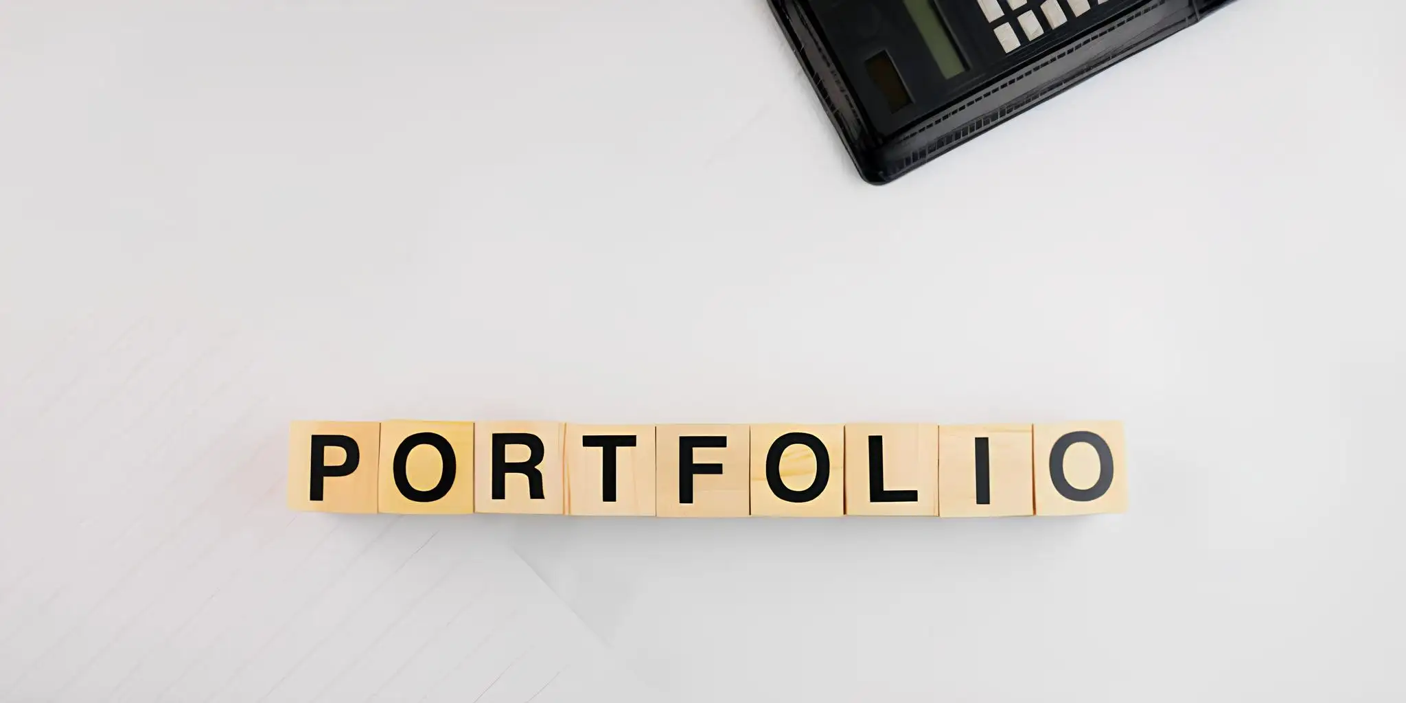 several wooden blocks form the word portfolio