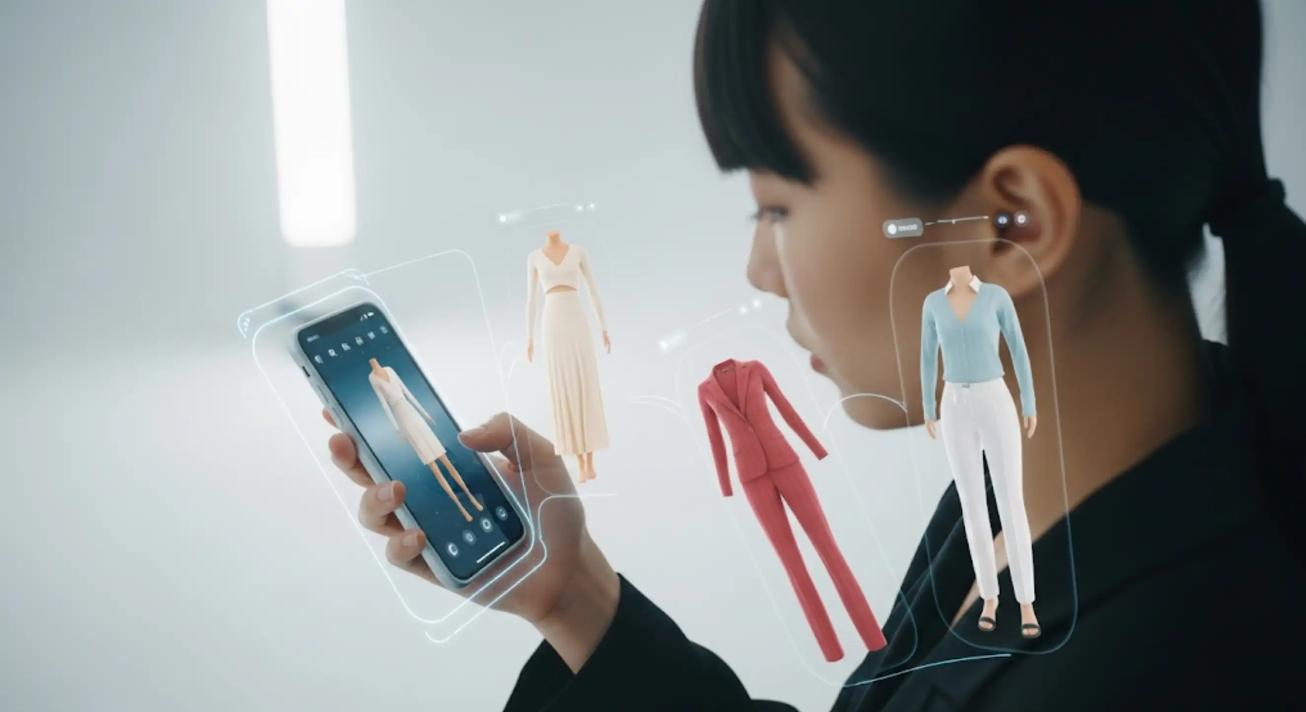 A customer using augmented reality for a virtual try-on, a key trend in fashion ecommerce. A customer using augmented reality for a virtual try-on, a key trend in fashion ecommerce.