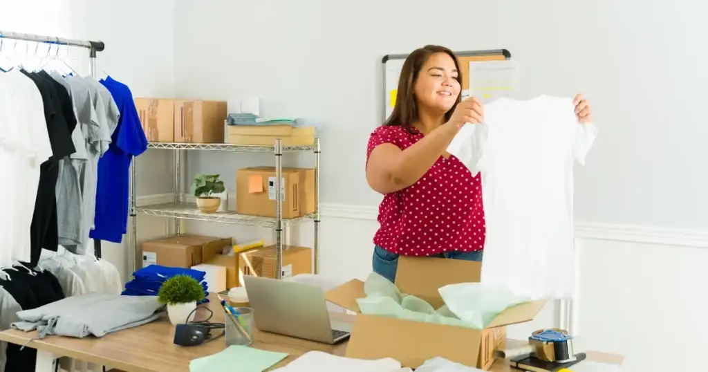 A creative teen starting a custom apparel business, a top small business idea for teens. A creative teen starting a custom apparel business, a top small business idea for teens.