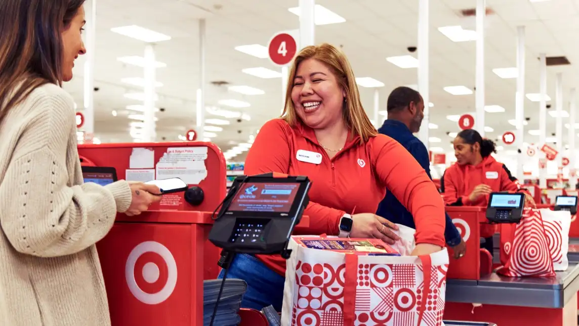 people happily shopping in target