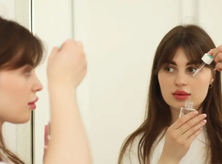 a girl doing skincare