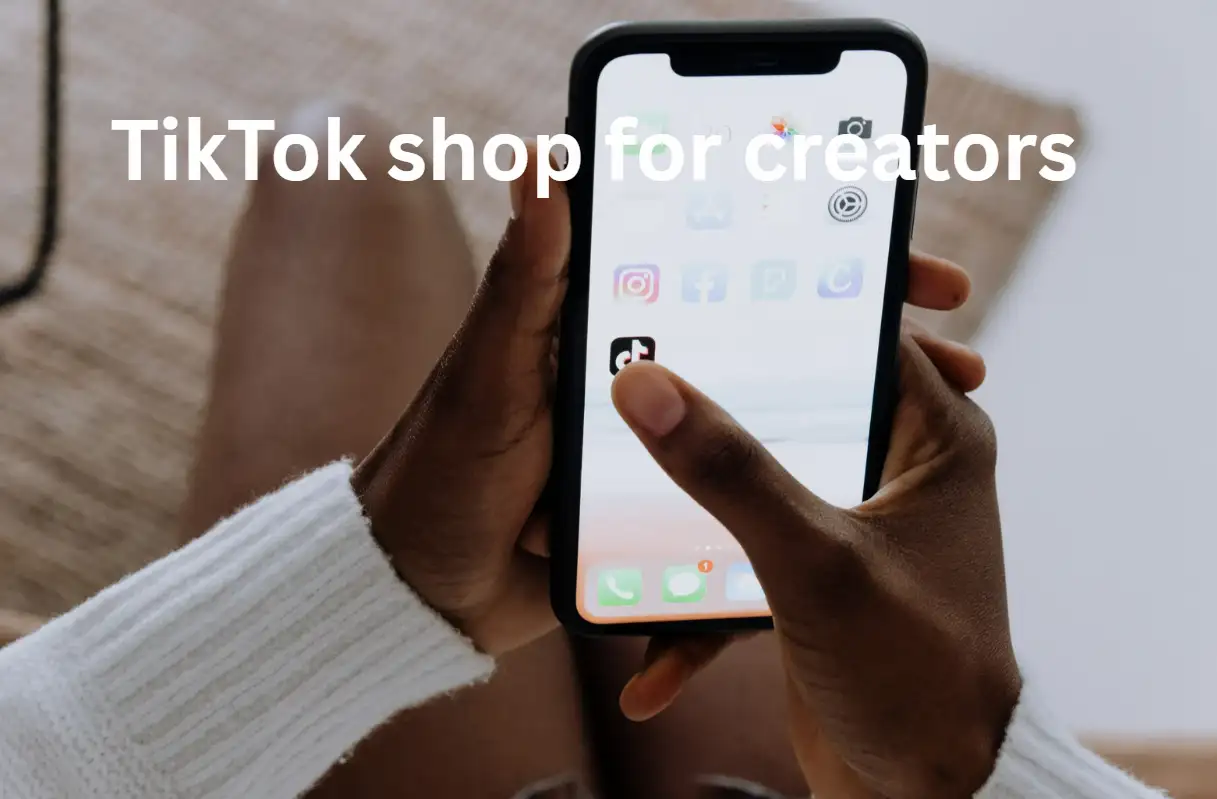 One hand clicks on the TikTok icon on the phone