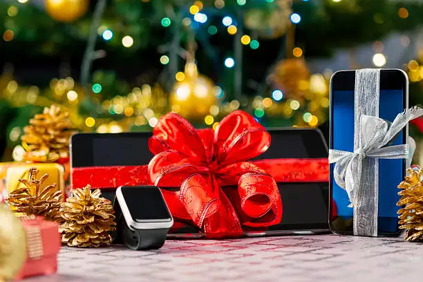 A selection of modern tech gifts for dad, including a smartwatch and wireless earbuds, featured in our gift guide. A selection of modern tech gifts for dad, including a smartwatch and wireless earbuds, featured in our gift guide.