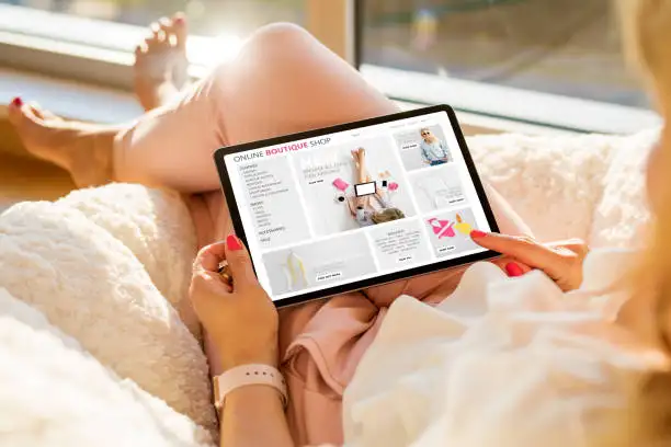 person browsing through beauty and fashion website